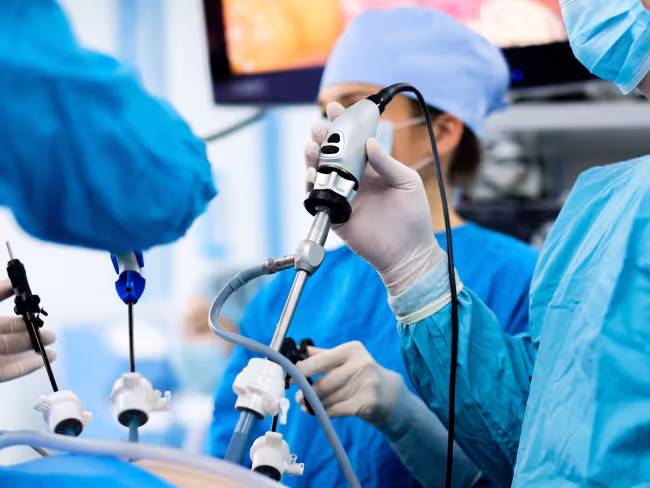 Surgeons performing laparoscopic surgery